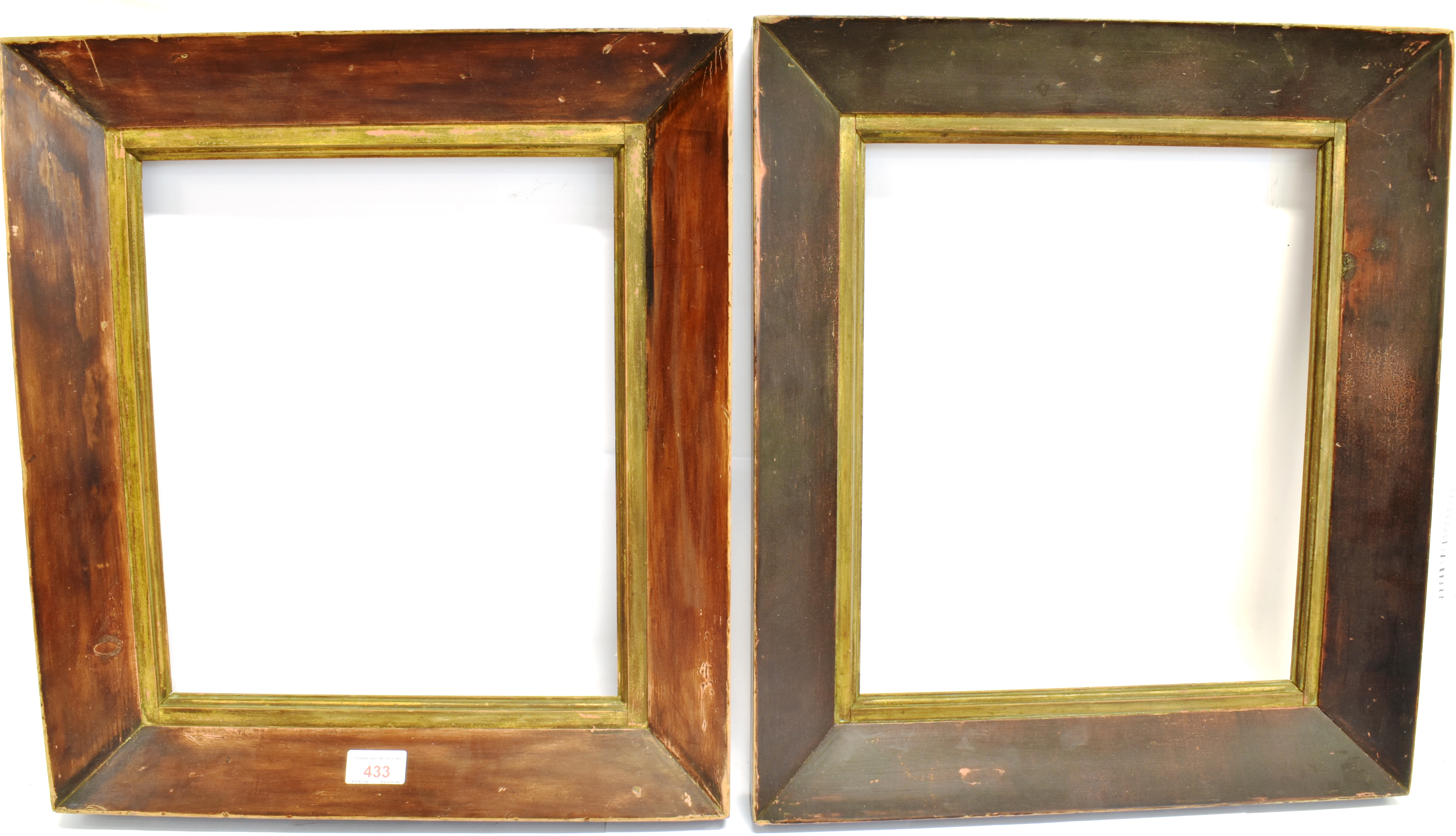 TWO STAINED AND BEVELLED WOOD PICTURE FRAMES the inner apertures 36cm x 31cm and 37cm x 31cm.