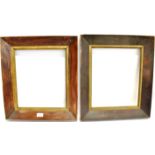 TWO STAINED AND BEVELLED WOOD PICTURE FRAMES the inner apertures 36cm x 31cm and 37cm x 31cm.