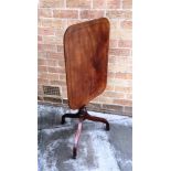 A MAHOGANY TILT TOP OCCASIONAL TABLE the oblong top with line inlaid decoration 44cm x 61cm, on