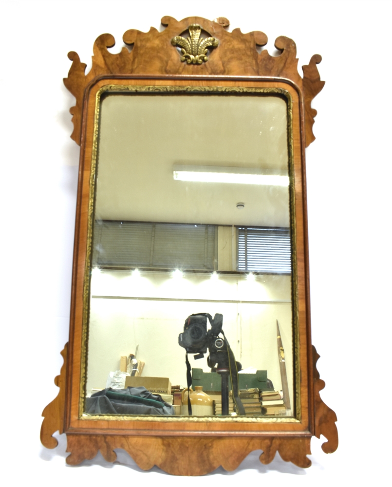 A MAHOGANY & WALNUT VENEERED PIER MIRROR with fleurs-de-lys detail to the cresting border, overall