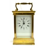 A FRENCH LACQUERED BRASS 8-DAY CARRIAGE CLOCK the enamel dial with Roman and Arabic numerals, signed