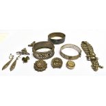 A SMALL QUANTITY OF VICTORIAN AND LATER SILVER JEWELLERY comprising three bangles, three brooches,