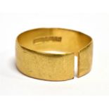 A HALLMARKED 22 CARAT GOLD WEDDING BAND as found, split shank, weighing 3.6 grams Condition Report :