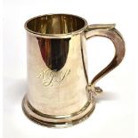 A SILVER MUG the cylindrical form silver mug with flat spreading base, C scroll handle, hallmarked