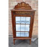 AN EDWARDIAN MAHOGANY DISPLAY CABINET with floral marquetry inlaid decoration, the lead glazed