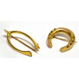 TWO 9 CARAT GOLD BROOCHES comprising horse shoe, inscription 1889, and a wishbone brooch, both of