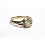 A DIAMOND SOLITAIRE 18 CARAT WHITE GOLD RING the illusion set round brilliant cut diamond weighing