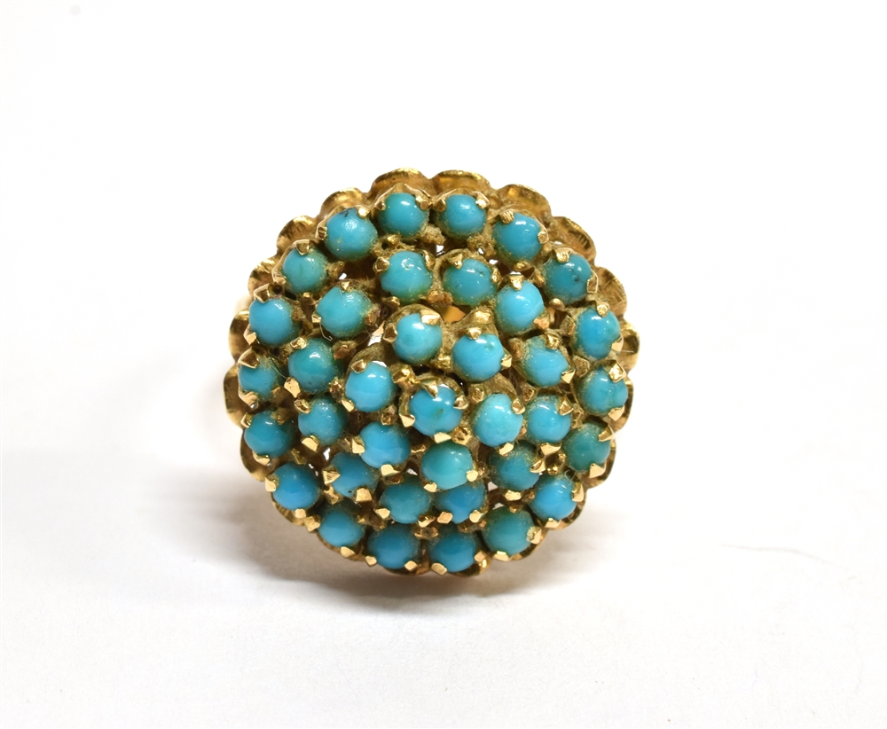 A TURQUOISE FOUR TIER ROUND CLUSTER YELLOW GOLD RING the cluster comprising small round cabochon cut - Image 2 of 3