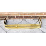 A VICTORIAN BRASS FENDER 93cm wide 31cm deep 13cm high