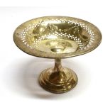 A SILVER COMPORT the round comport pierced with embossed swag decoration, 19cm diameter, the