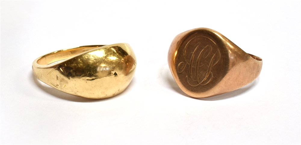 TWO 9 CARAT GOLD GENTS RINGS comprising one rose gold oval front signet ring, split shank, weight