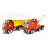 ASSORTED TOYS comprising a Tonka pressed steel tipper lorry, 32cm long; a Sanson Junior pressed