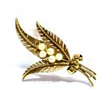 A 9CT GOLD FERN LEAF SPRAY BROOCH three fern leaves with five small cultured pearls to centre,