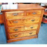 AN EDWARDIAN WALNUT CHEST OF TWO SHORT AND THREE LONG DRAWERS 104cm wide 47cm deep 101cm high
