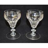 A PAIR OF JACOBITE STYLE GLASSES each engraved with six-petalled rose, closed and open rose buds, an