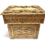 A CHINESE CARVED HARDWOOD FOLDING STOOL/TABLE allover carving of dragons, birds and stylised