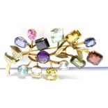 A MULTI GEM SET YELLOW GOLD SPRAY BROOCH stones to include blue sapphire, garnet, green