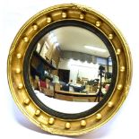 A GILT FRAMED CONVEX MIRROR 55cm diameter overall