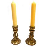 A PAIR OF GILT CANDLESTICKS inset with mirrors, 23cm high