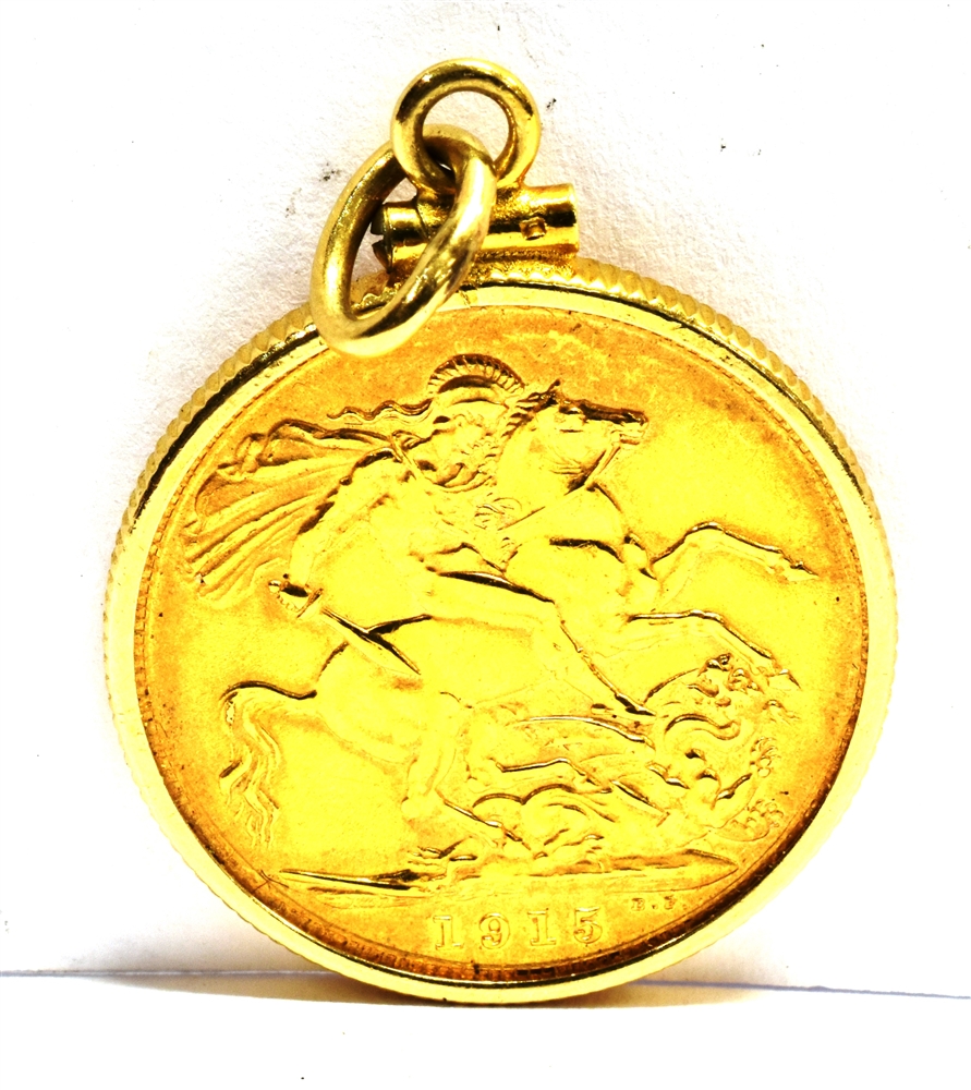 A FULL SOVEREIGN GOLD PENDANT the coin dated 1915with simple 9ct gold bezel surround with milled - Image 2 of 2