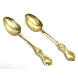 A PAIR OF VICTORIAN SILVER DESSERT SPOONS by James Whiting, London Hallmarks for 1846, 18cm long,