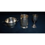 THREE ITEMS OF SILVERWARE comprising a two handled small bowl, 10cm diameter, a small christening