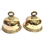 A PAIR OF OLD SHEFFIELD PLATE DOMED DISH COVERS the bell shaped covers with scroll handles, pie