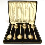 A BOXED SET OF SIX GEORGIAN SCOTTISH SILVER DESSERT SPOONS the plain old English pattern with bull