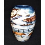 A MOORCROFT POTTERY VASE of ovoid form, in the 'Woodside Farm' pattern, decorated with foxes in