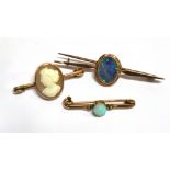 THREE 9CT GOLD BAR BROOCHES comprising a black opal fronted example with closed back setting, a opal
