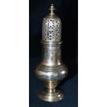 A SILVER SUGAR CASTER the traditional lighthouse baluster form with pierced detachable top on
