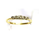 A DIAMOND FIVE STONE 18CT GOLD RING five small graduating round cut diamonds, total diamond weight