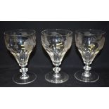 THREE JACOBITE STYLE GLASSES each engraved with six-petalled rose, closed and open rose buds, an oak