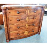 A VICTORIAN MAHOGANY BOWFRONT CHEST OF TWO SHORT AND THREE LONG DRAWERS flanked by octagonal