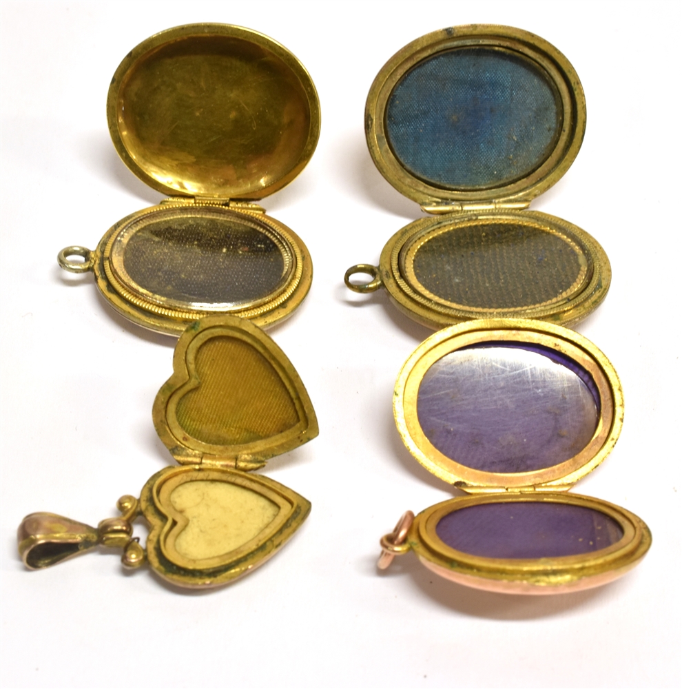 FOUR SMALL ASSORTED LOCKETS comprising oval 9ct gold back and front examples and one small yellow - Image 3 of 3