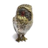 A SILVER OWL PEPPERETTE with red glass eyes and detachable head stamped 925 to base, 8cm high,