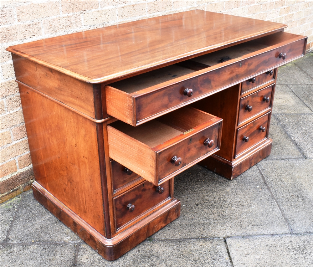 A MAHOGANY TWIN PEDESTAL DESK with plain top and single long frieze drawer above pedestals each - Image 2 of 3