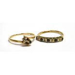 TWO 9CT GOLD STONE SET DRESS RINGS comprising a sapphire and diamond two stone crossover, claw