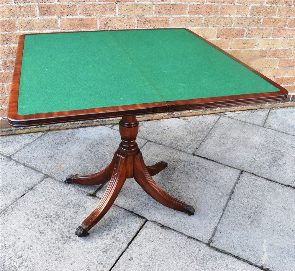 A REPRODUCTION MAHOGANY CARD TABLE on quatrefoil base, 85cm wide - Image 2 of 2