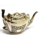 A SMALL SILVER PRESENTATION TEAPOT AS FOUND of oval form with embossed floral and scroll decoration,