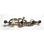 A VICTORIAN SAPPHIRE, DIAMOND AND SEED PEARL SET BAR BROOCH with clover and scroll design,