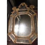 A LARGE VENETIAN GLASS MIRROR of octagonal form with shaped crest, engraved signature 'Fratelli
