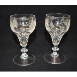 A PAIR OF JACOBITE STYLE GLASSES each engraved with six-petalled rose, closed and open rose buds, an
