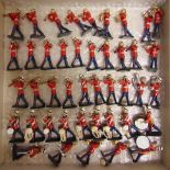 FORTY-THREE METAL MODEL BANDSMEN including pipes and drums, the bases unmarked, all unboxed.