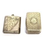 A GEORGIAN SILVER MINIATURE VINAIGRETTE the pin dot decorated rectangular vinaigrette with central