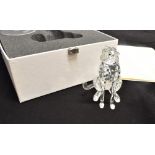 SWAROVSKI CRYSTAL: a seated leopard, 10cm high, boxed with paperwork