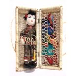 A HONG KONG 'CHIEH-CHIEH' OR 'ELDER SISTER' CLOTH DOLL with various costumes, 28.5cm high.