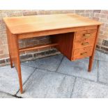 A MID 20TH CENTURY DESK IN THE MANNER OF GORDON RUSSEL fitted with three drawers, 114cm wide 68cm