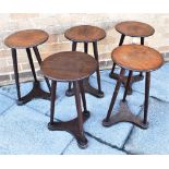 FIVE MATCHING UNUSUAL MAHOGANY WORK TABLES the circular tops 31cm diameter, three pillar supports to