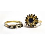 TWO 9CT GOLD SAPPHIRE AND WHITE STONE SET DRESS RINGS comprising a three tier cluster and a seven